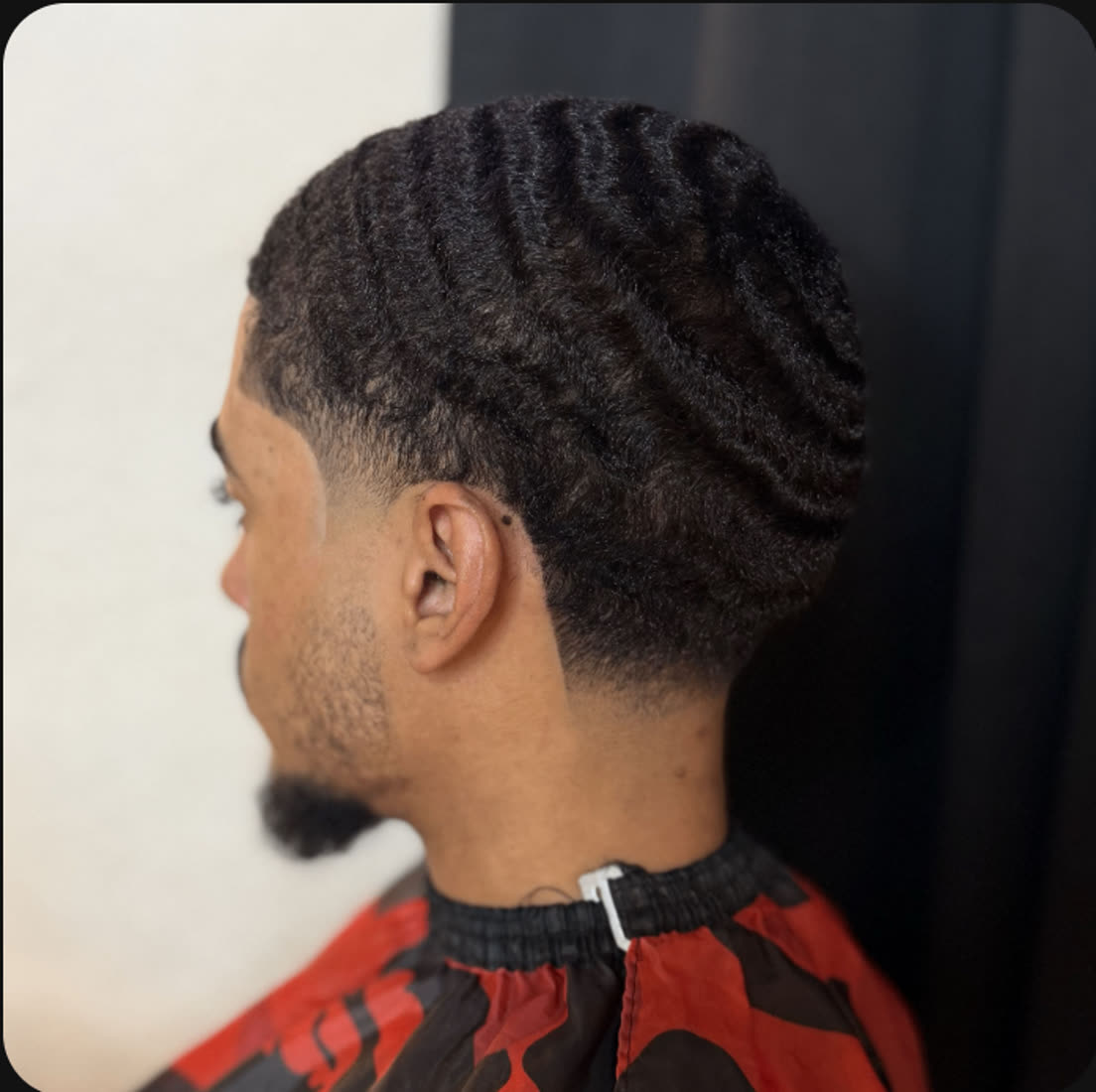Haircut with taper and waves by Yash Blendz